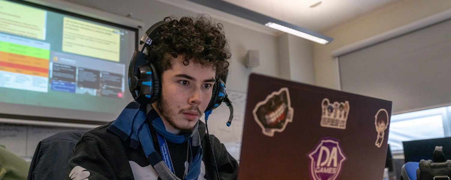 Media student uses a laptop